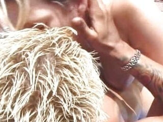 Busty oiled MILF fucked by the pool