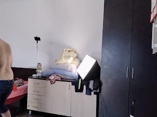 Amateur wife having fun trying on clothes and cutting them.