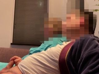 'Casual handjob from wife while watching tv on couch'