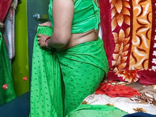 Beautiful Indian bhabhi is wearing saree.